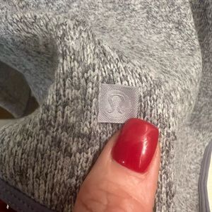 Lululemon hooded pullover.  Lilac/gray.  Never worn. Size 4